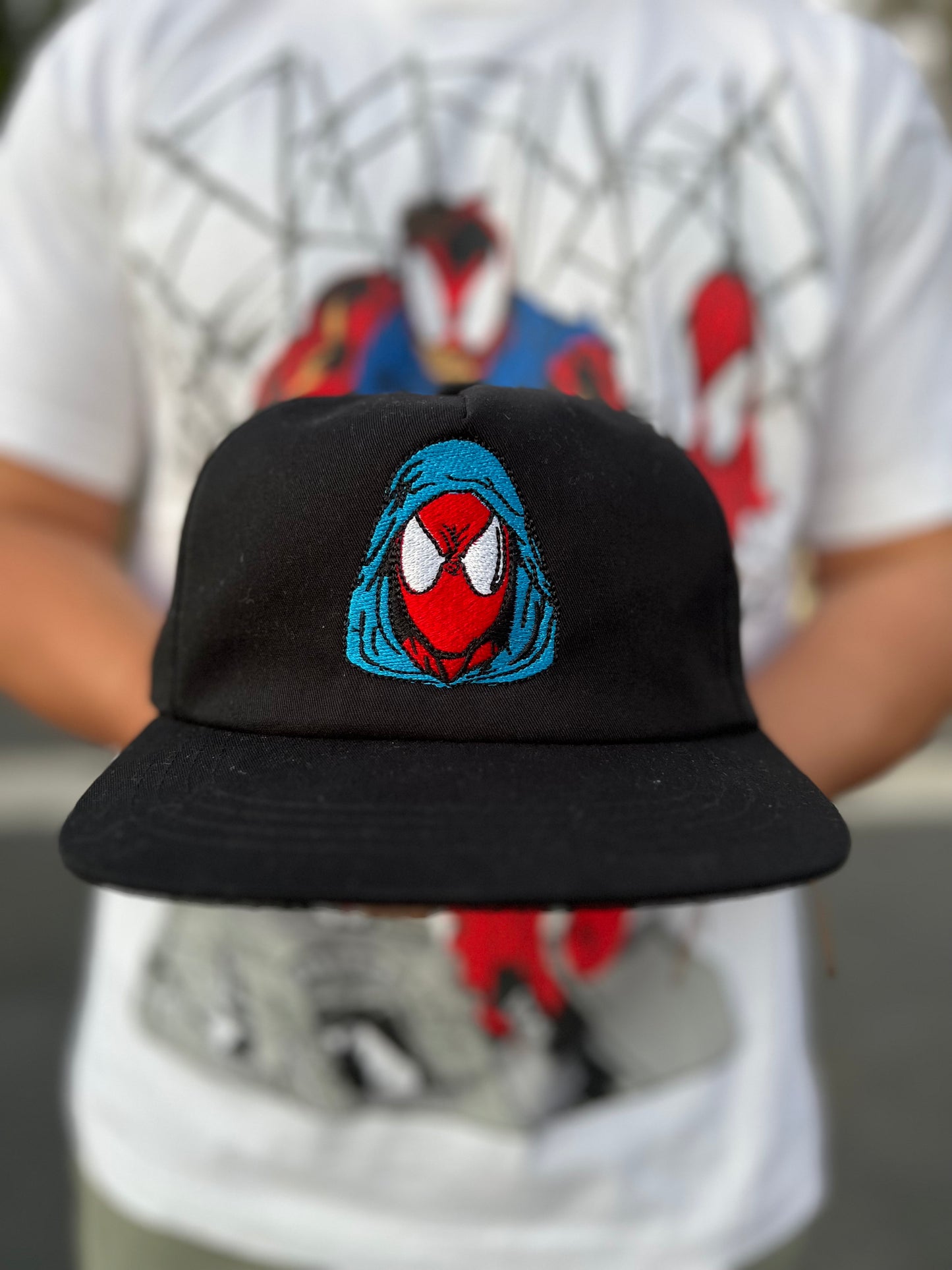 Suspect is wearing a blue hood