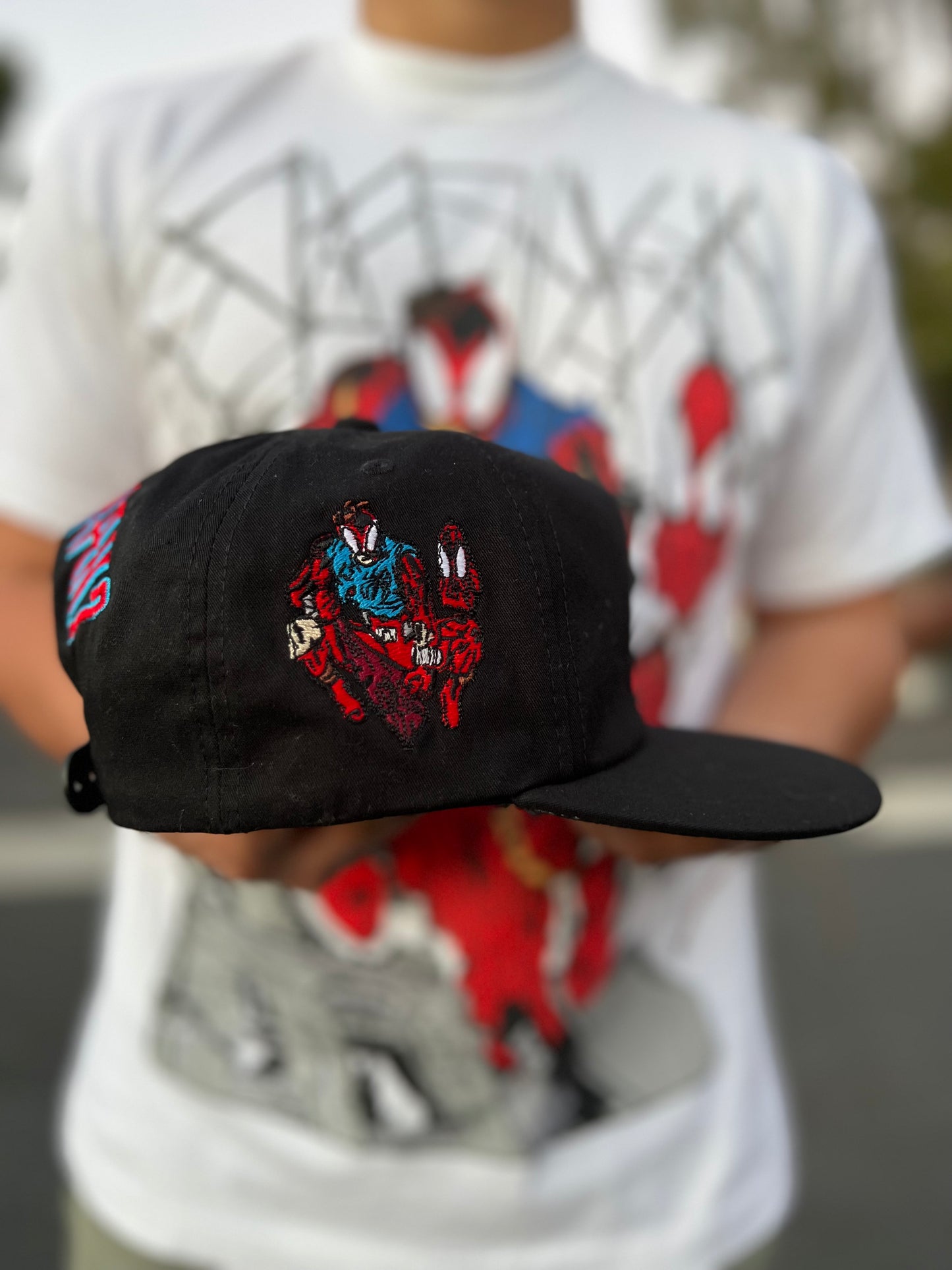 Suspect is wearing a blue hood